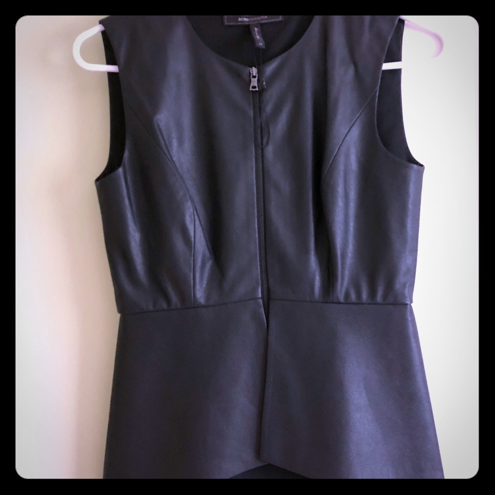Black Leather Peplum with Zipper Front Detail.